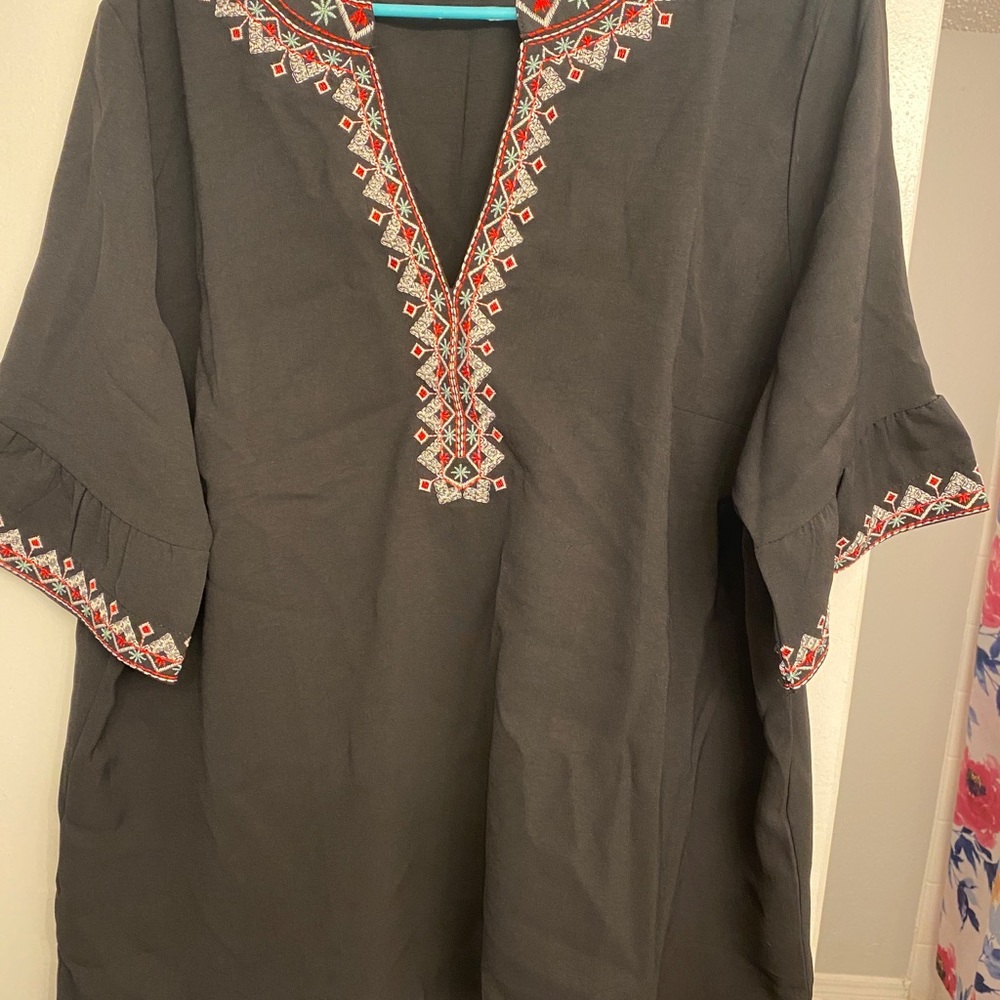 2x black shirt. New- no tags. Bought off Amazon & not able to return. Never worn